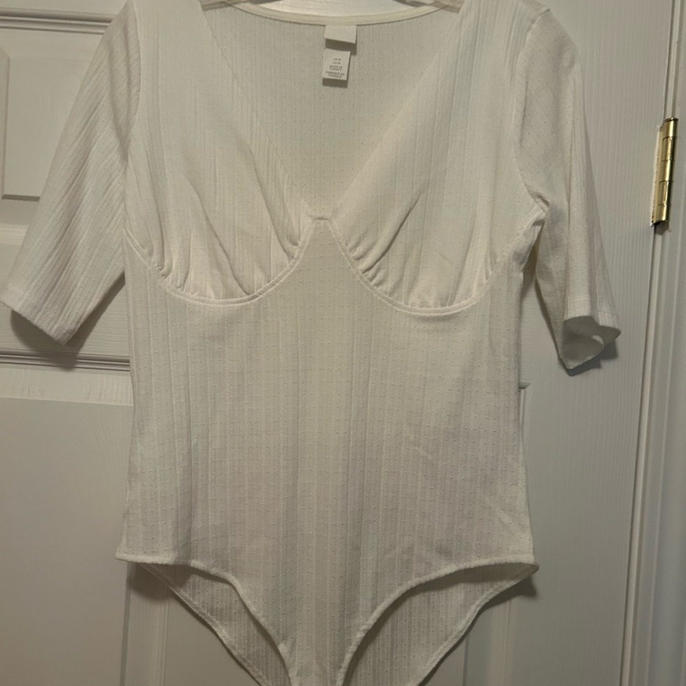 Elegant White Ribbed Bodysuit